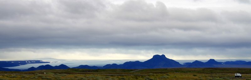 Clouds, the ocean, dark lava rocks and tough foliage create an awesome vision on this island so aptly named Iceland!