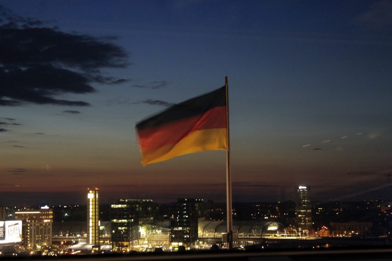 The evening sky with the German flag glowing with the lights from the city below, a Reichstag moment!